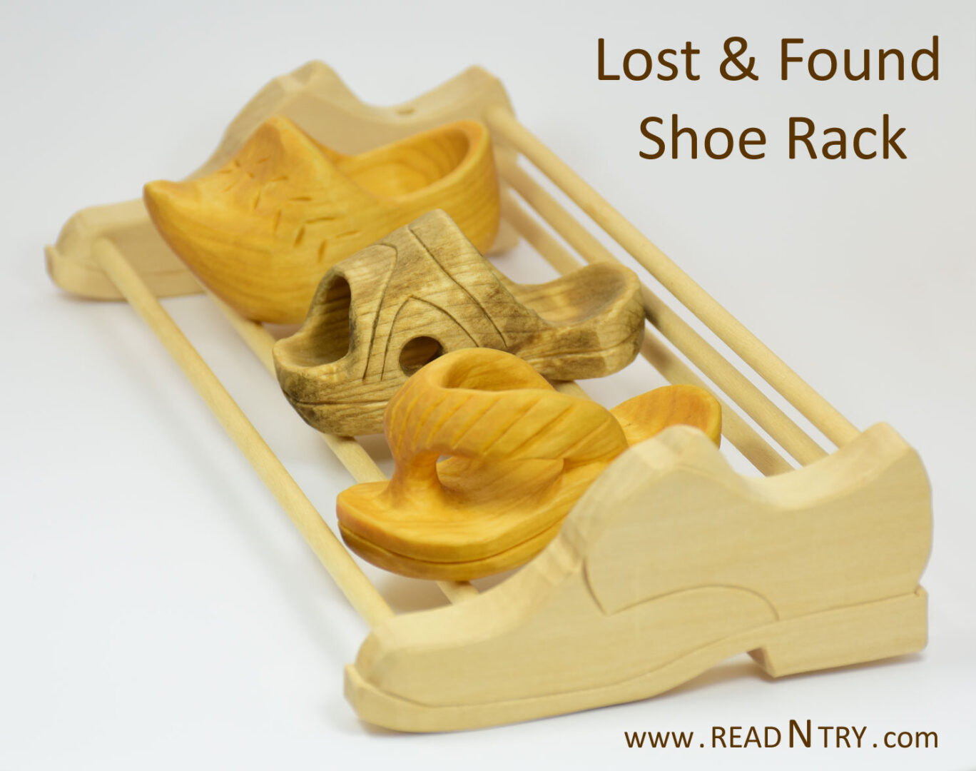 Shoe rack with a flip-flop, a sandal, and a clog. Carving shoes was fun.