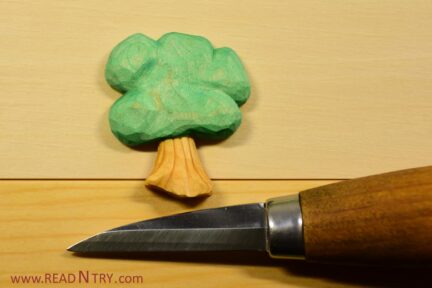 Carved tree with straight blade knife. It is an example of carving basswood -- the best wood to carve in my opinion.