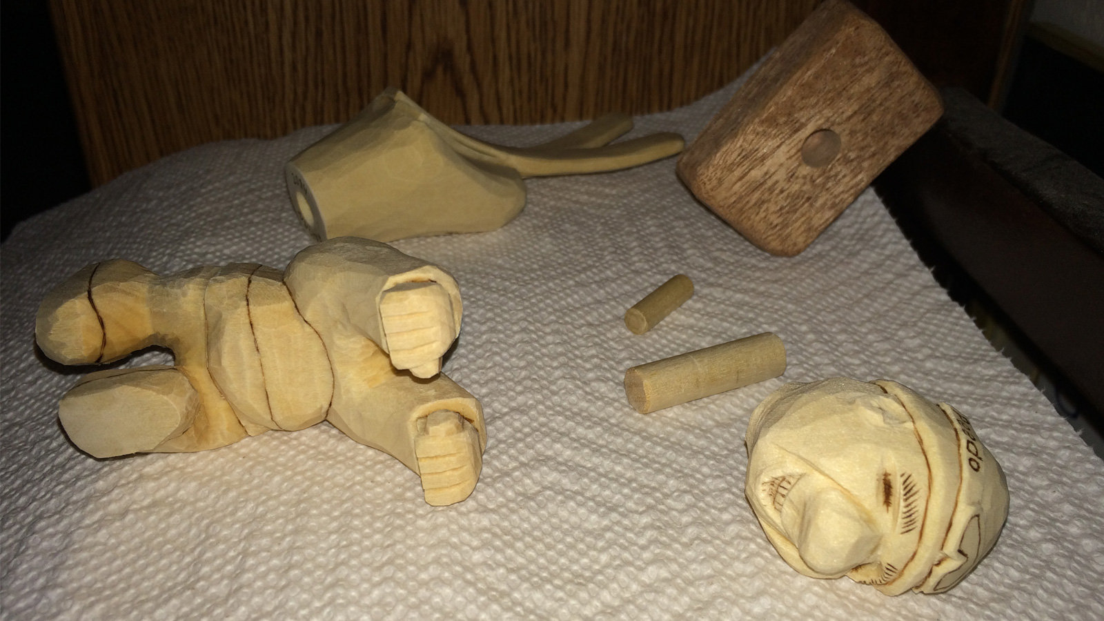 Several parts of the skier caricature were carved from basswood, woodburned, and are ready to be assembled.